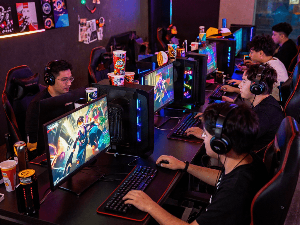 Login LUXURY111 dalam suasana gaming lounge dengan pemain kompetitif dan aksesori permainan yang menarik.